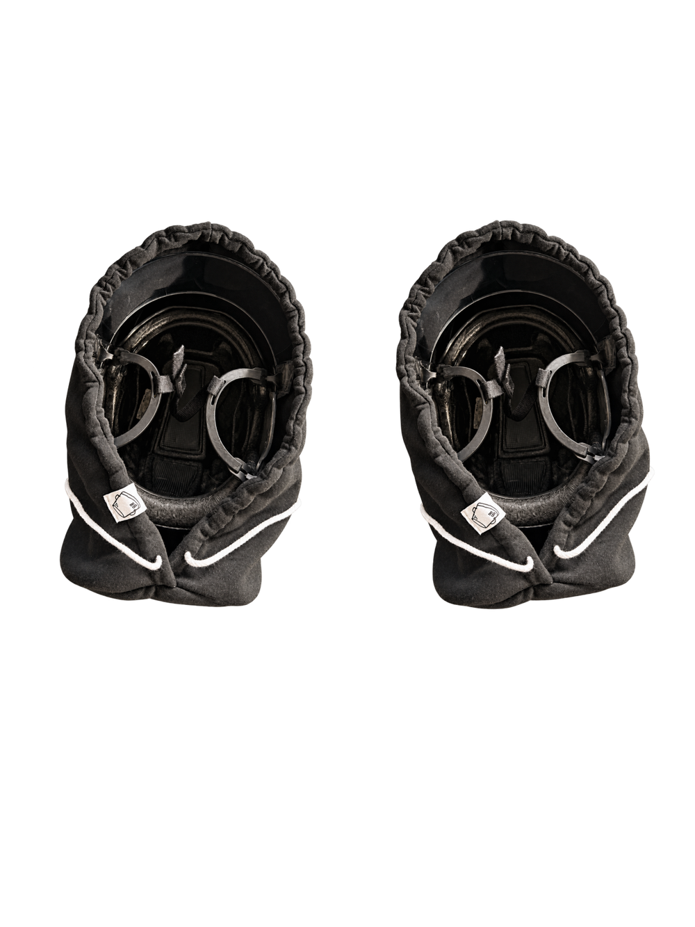 Two black Bucket Hoods arranged side by side on a transparent background